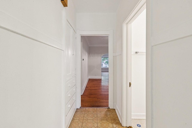 217 S Oak Park Ave, Oak Park, IL 60302 - hallway featuring light tile patterned floors and arched walkways