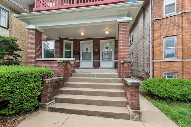 217 S Oak Park Ave, Oak Park, IL 60302 - view of exterior entry with covered porch and brick siding