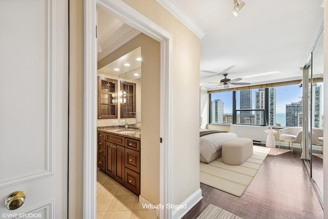 1560 N Sandburg Ter Unit 2202, Chicago, IL 60610 - sunroom / solarium featuring a sink and a city view
