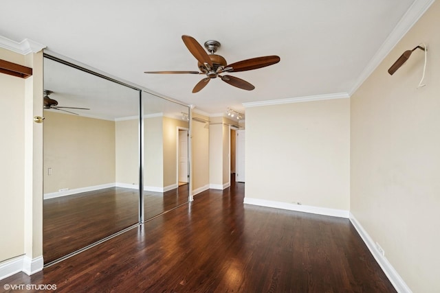 1560 N Sandburg Ter Unit 2202, Chicago, IL 60610 - spare room featuring a ceiling fan, wood finished floors, ornamental molding, and baseboards