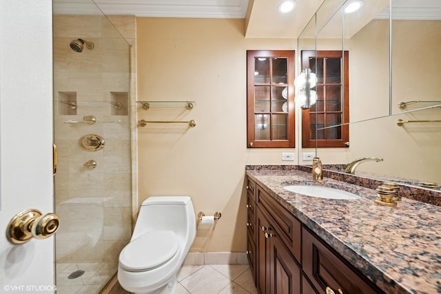 1560 N Sandburg Ter Unit 2202, Chicago, IL 60610 - full bath featuring tile patterned flooring, vanity, a tile shower, toilet, and crown molding