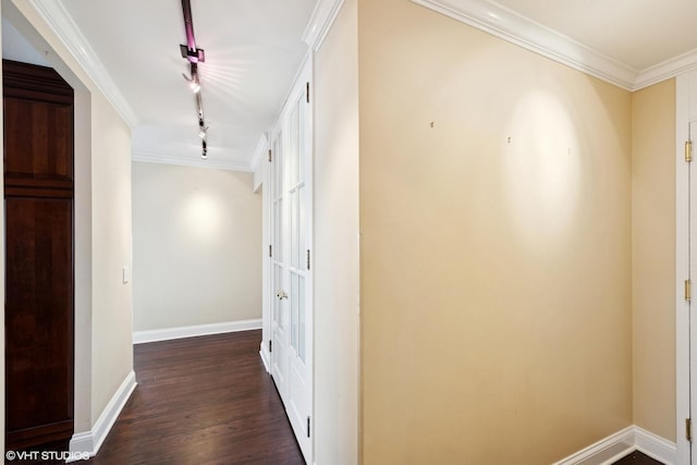 1560 N Sandburg Ter Unit 2202, Chicago, IL 60610 - hallway with rail lighting, dark wood finished floors, baseboards, and ornamental molding