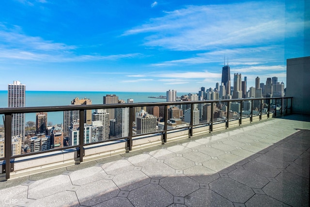 1560 N Sandburg Ter Unit 2202, Chicago, IL 60610 - view of patio / terrace featuring a view of skyline, a water view, and a balcony