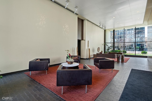 1560 N Sandburg Ter Unit 2202, Chicago, IL 60610 - community lobby featuring a wall of windows and a towering ceiling
