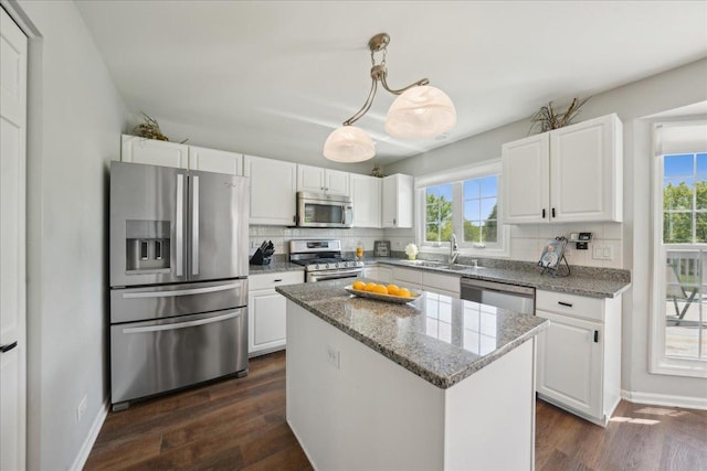 616 Meadowview Dr, West Chicago, IL 60185 - kitchen with stainless steel appliances, a sink, plenty of natural light, and tasteful backsplash
