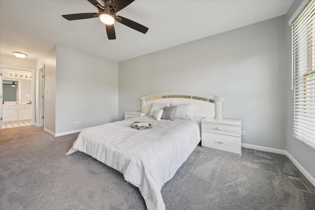 616 Meadowview Dr, West Chicago, IL 60185 - carpeted bedroom featuring baseboards, ensuite bath, and ceiling fan