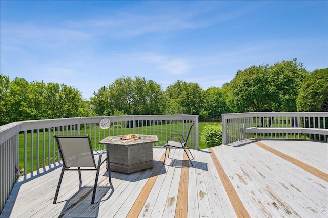 616 Meadowview Dr, West Chicago, IL 60185 - deck featuring a fire pit and a lawn