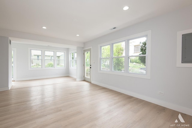 26415 W Beach St, Antioch, IL 60002 - unfurnished living room with healthy amount of natural light, baseboards, and recessed lighting