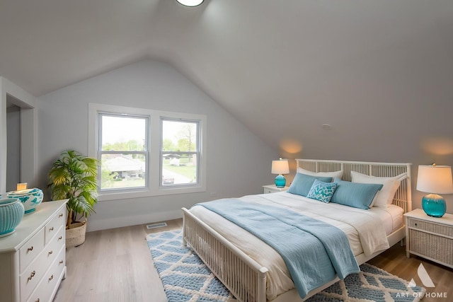 26415 W Beach St, Antioch, IL 60002 - bedroom with vaulted ceiling and light wood-style floors
