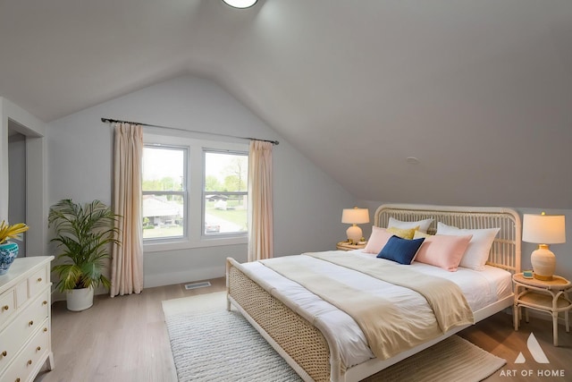 26415 W Beach St, Antioch, IL 60002 - bedroom featuring lofted ceiling and light wood-type flooring