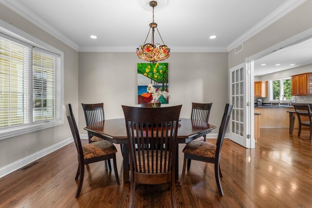 6312 Kingsbridge Dr, Cary, IL 60013 - dining room featuring dark wood-type flooring, recessed lighting, and crown molding