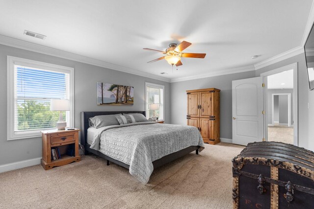 6312 Kingsbridge Dr, Cary, IL 60013 - bedroom with ornamental molding, light carpet, and a ceiling fan