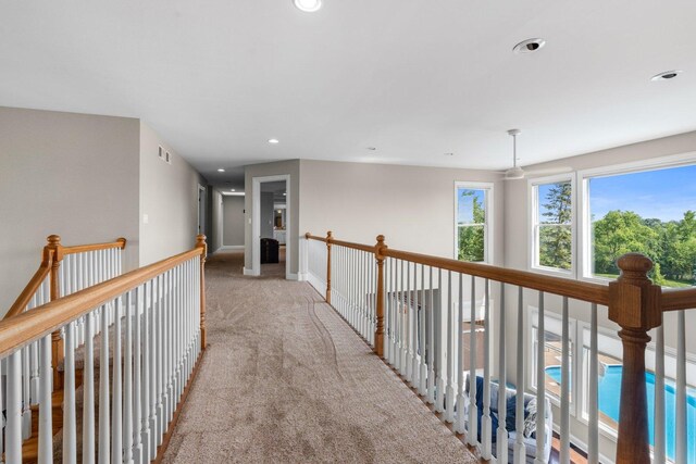 6312 Kingsbridge Dr, Cary, IL 60013 - corridor with light carpet and recessed lighting