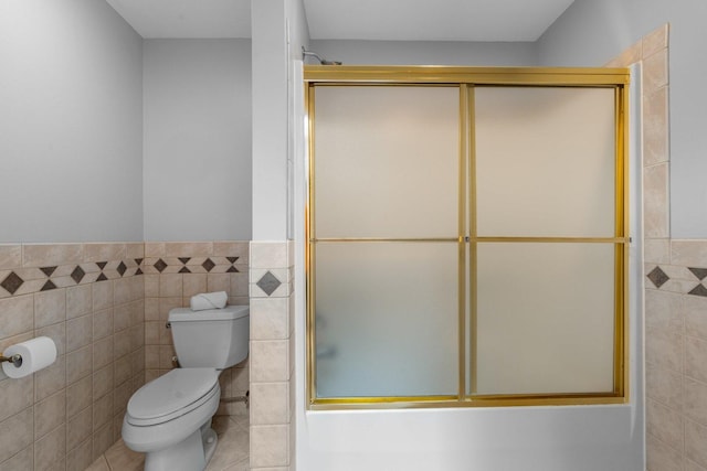 6312 Kingsbridge Dr, Cary, IL 60013 - bathroom with tile walls, wainscoting, and tile patterned floors