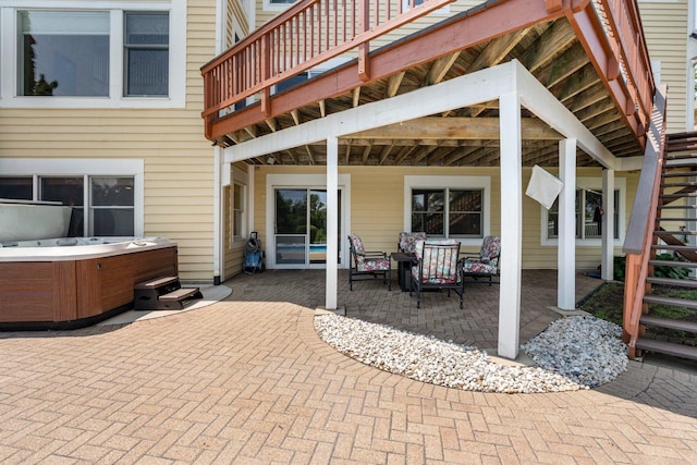 6312 Kingsbridge Dr, Cary, IL 60013 - view of patio / terrace with a hot tub, a wooden deck, and stairs