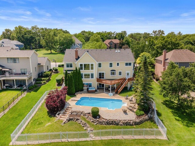 6312 Kingsbridge Dr, Cary, IL 60013 - view of swimming pool featuring stairway, a fenced backyard, a wooden deck, and a patio