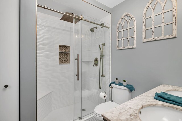 26138 Oak Ridge Ct, Channahon, IL 60410 - bathroom featuring toilet, vanity, and a shower stall