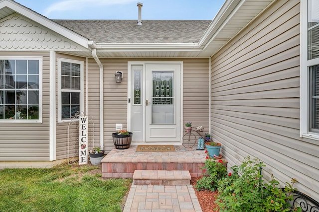 26138 Oak Ridge Ct, Channahon, IL 60410 - entrance to property with a shingled roof
