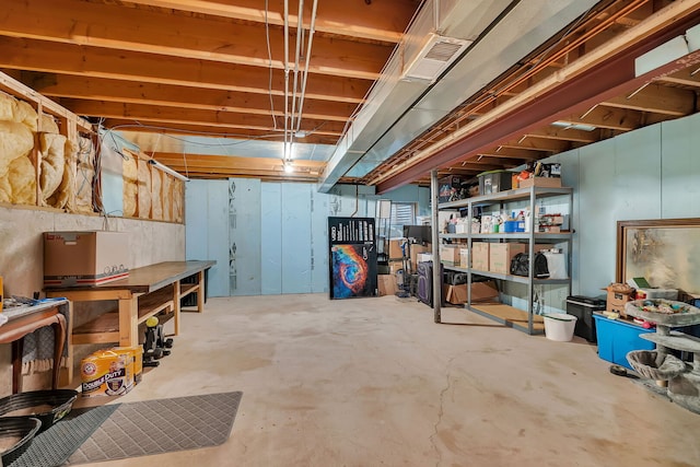 26138 Oak Ridge Ct, Channahon, IL 60410 - unfinished below grade area with a workshop area