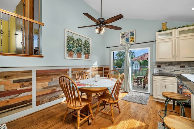 26138 Oak Ridge Ct, Channahon, IL 60410 - dining room with light wood-style flooring, ceiling fan, and high vaulted ceiling