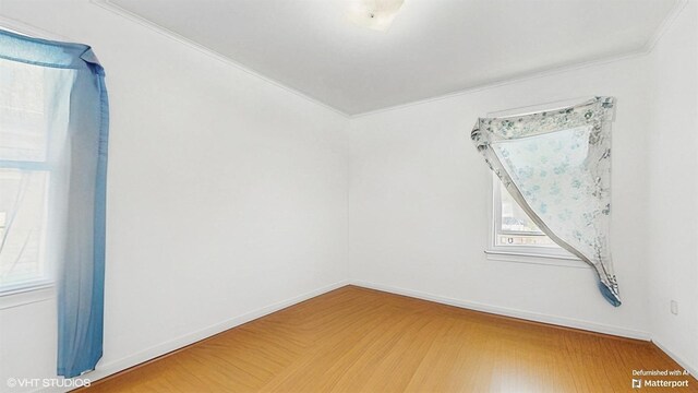 6145 S Nashville Ave, Chicago, IL 60638 - empty room with baseboards and crown molding