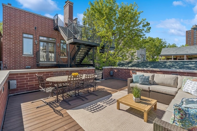 3823 N Wayne Ave, Chicago, IL 60613 - wooden terrace with an outdoor living space, french doors, stairway, and outdoor dining area