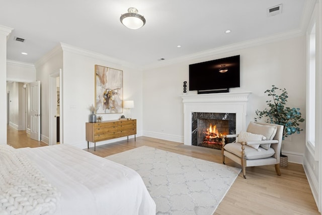 3823 N Wayne Ave, Chicago, IL 60613 - bedroom with light wood-style flooring, a high end fireplace, ornamental molding, recessed lighting, and baseboards