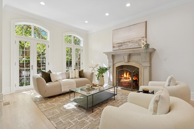 3823 N Wayne Ave, Chicago, IL 60613 - living area with french doors, wood finished floors, recessed lighting, a high end fireplace, and crown molding