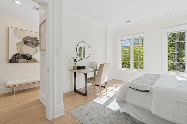 3823 N Wayne Ave, Chicago, IL 60613 - bedroom featuring crown molding, multiple windows, light wood-style floors, baseboards, and a desk