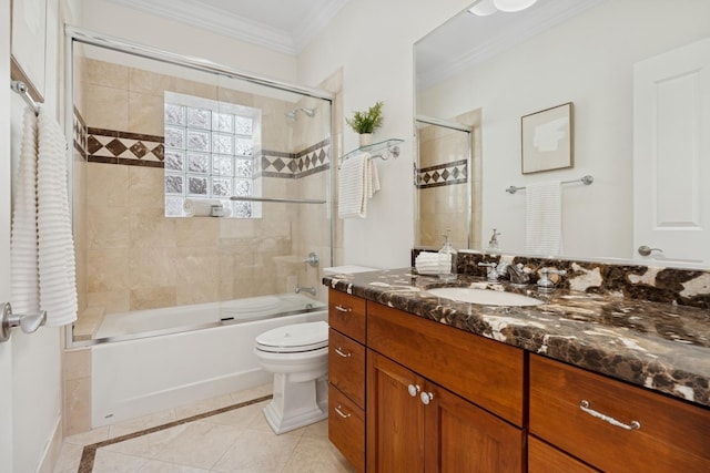 3823 N Wayne Ave, Chicago, IL 60613 - full bathroom featuring crown molding, vanity, inlaid floor details, toilet, and combined bath / shower with glass door
