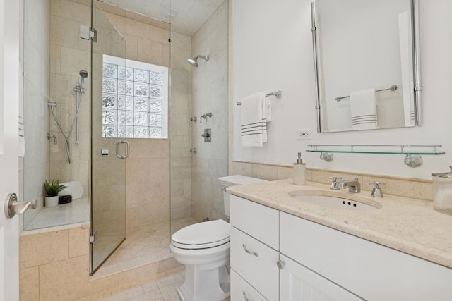 3823 N Wayne Ave, Chicago, IL 60613 - bathroom with vanity, a stall shower, and toilet