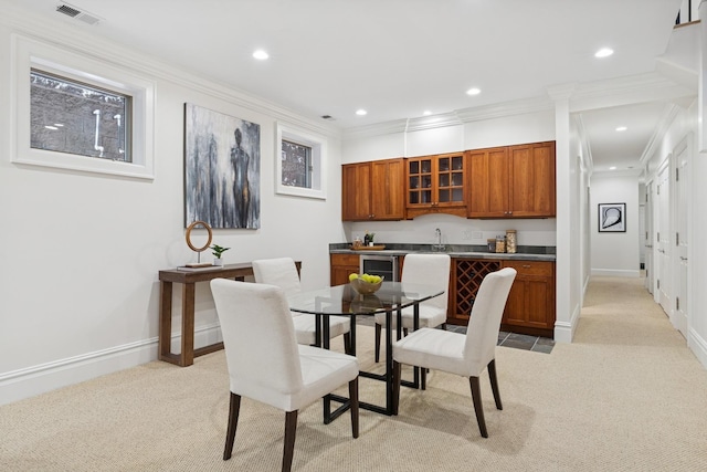 3823 N Wayne Ave, Chicago, IL 60613 - dining area with light carpet, recessed lighting, baseboards, ornamental molding, and beverage cooler