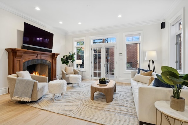 3823 N Wayne Ave, Chicago, IL 60613 - living room featuring a high end fireplace, wood finished floors, plenty of natural light, recessed lighting, and crown molding