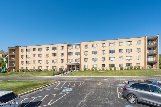 6660 S Brainard Ave Unit 201, Countryside, IL 60525 - view of apartment building / complex with uncovered parking