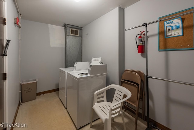 6660 S Brainard Ave Unit 201, Countryside, IL 60525 - communal laundry room featuring baseboards