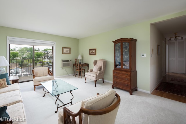 6660 S Brainard Ave Unit 201, Countryside, IL 60525 - living area featuring light colored carpet, a wall mounted AC, and baseboards