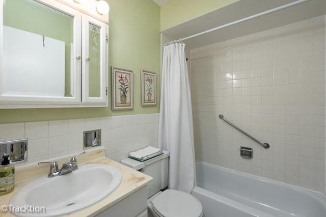 6660 S Brainard Ave Unit 201, Countryside, IL 60525 - bathroom with tile walls, toilet, vanity, and shower / bathtub combination with curtain