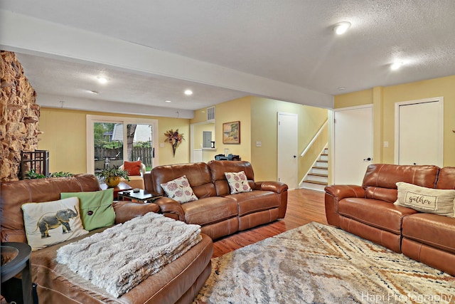 4125 Victoria Dr, Hoffman Estates, IL 60192 - living area featuring wood finished floors, stairway, recessed lighting, and a textured ceiling