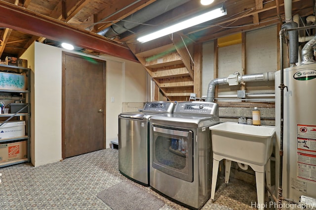 4125 Victoria Dr, Hoffman Estates, IL 60192 - laundry area with gas water heater, separate washer and dryer, and tile patterned floors