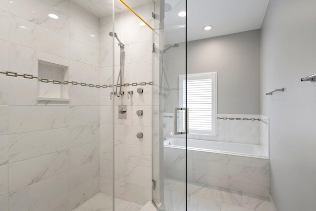 1429 S Prairie Ave, Chicago, IL 60605 - full bathroom with a bath, a stall shower, and recessed lighting