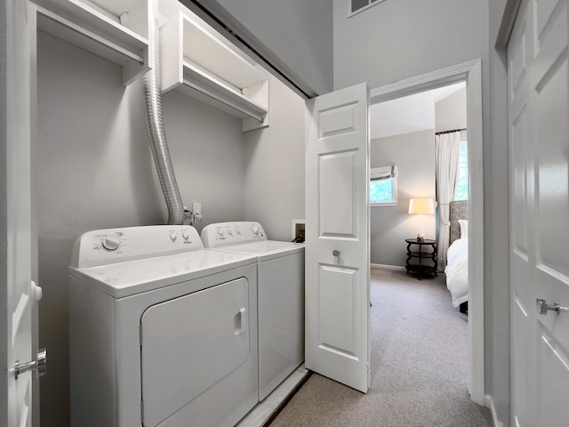 1429 S Prairie Ave, Chicago, IL 60605 - laundry area featuring washing machine and dryer, light carpet, and baseboards