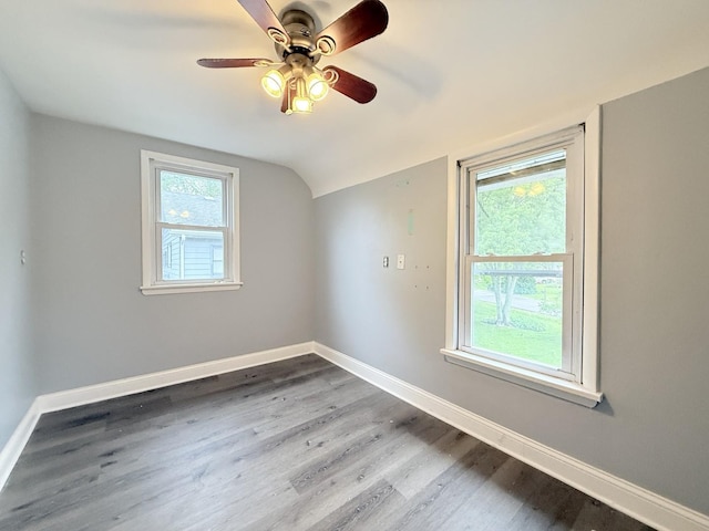 1634 Scott Blvd, Geneva, IL 60134 - additional living space featuring vaulted ceiling, baseboards, wood finished floors, and a ceiling fan