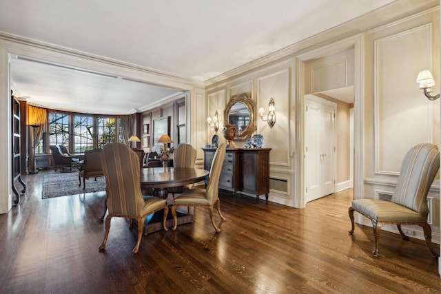 199 E Lake Shore Dr Unit 3, Chicago, IL 60611 - dining area with a decorative wall, crown molding, and wood finished floors