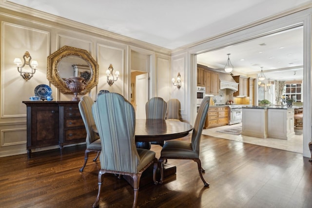 199 E Lake Shore Dr Unit 3, Chicago, IL 60611 - dining room with a decorative wall, wood finished floors, and ornamental molding
