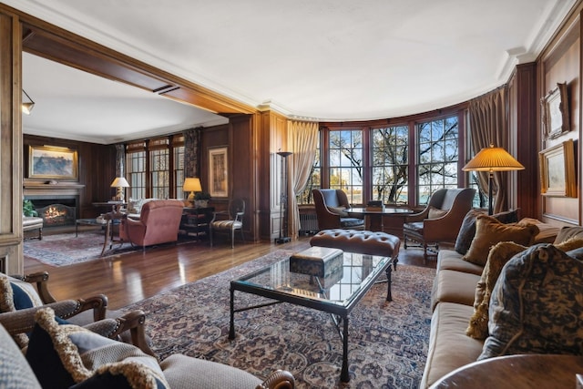 199 E Lake Shore Dr Unit 3, Chicago, IL 60611 - living room featuring ornamental molding, a lit fireplace, and wood finished floors