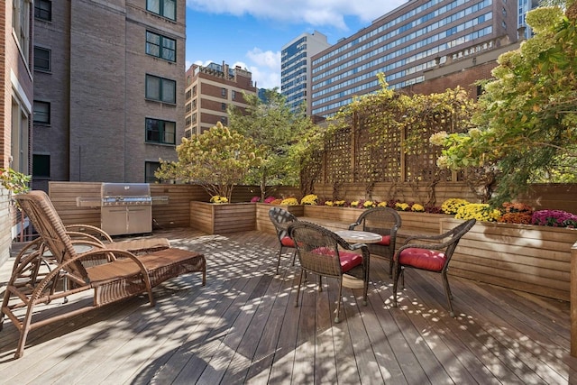 199 E Lake Shore Dr Unit 3, Chicago, IL 60611 - deck with a grill and outdoor dining space