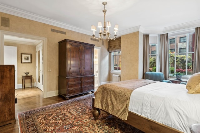 199 E Lake Shore Dr Unit 3, Chicago, IL 60611 - bedroom with a chandelier, ornamental molding, dark wood finished floors, baseboards, and radiator