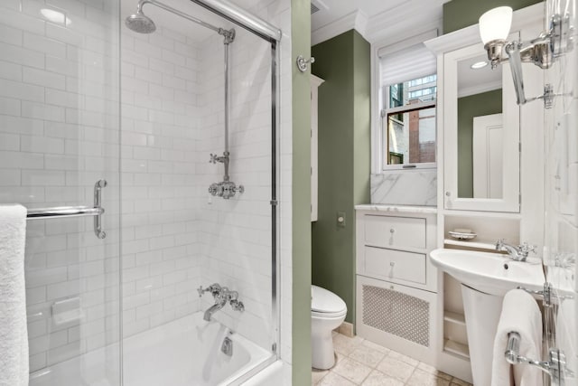 199 E Lake Shore Dr Unit 3, Chicago, IL 60611 - bathroom featuring crown molding, toilet, and shower / bath combination with glass door