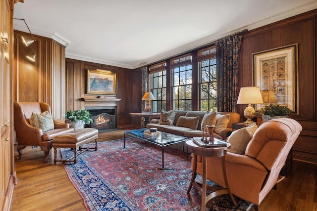 199 E Lake Shore Dr Unit 3, Chicago, IL 60611 - living room with light wood-style flooring, a lit fireplace, and crown molding