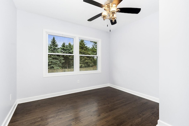 11S561 Saratoga Ave, Lemont, IL 60439 - spare room with dark wood-type flooring, baseboards, and a ceiling fan